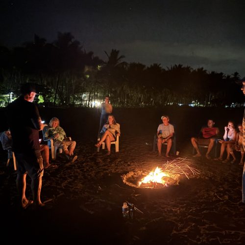 People sitting around a fire